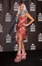 Singer Lady Gaga poses in the press room of the 2010 MTV Video Music Awards at the Nokia Theatre in
