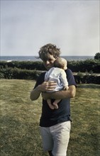 Robert (Bobby) Kennedy with one of his children.