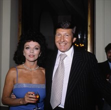 JOAN COLLINS
British Actress and Writer
with her 3rd husband RONALD KASS
British Writer and