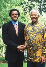 CARL LEWIS
Former American Athlete
with NELSON MANDELA
President of South...