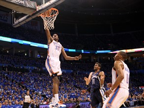 01 May 2011: Thunder forward Kevin Durant (35) dunks over Memphis guard Mike Conley (11) during