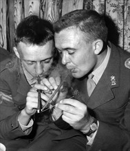Danish soldiers in Bavaria smoke a Virginia cigar
