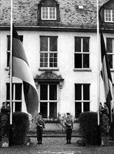German and French national flags in front of French headquarters building in Tübingen