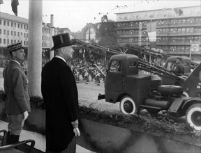 André Francois-Poncet during parade of French troops on Bastille Day in Koblenz