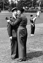 French commander during the traditional symbolic kiss