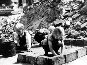 Post-war period - Children on site of ruins