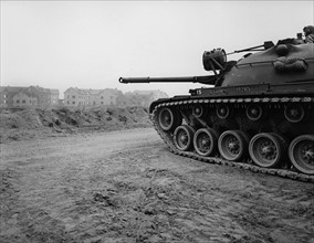 Patton tank during manoeuvre of US army in ghost village Parks Range in Berlin