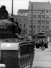 US tank and water-gun vehicle of the People's Police at checkpoint Friedrichstraße