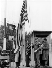 US flag is hoisted up at checkpoint Helmsted