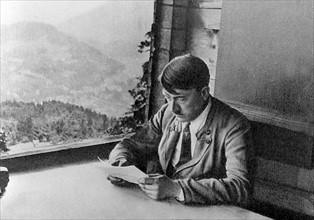 Adolf Hitler reads