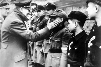 Hitler decorates adolescents of the Volkssturm