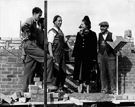 Prime Minister Margaret Thatcher talking with workers