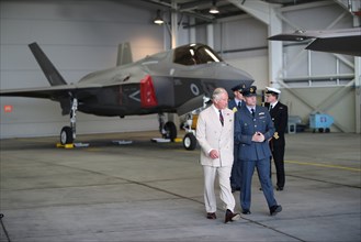 Britain's Prince Charles stands in front of an F-35 during a visit to 617 Squadron, the UK's first F-35 Lightning Squadron based at RAF Marham, Kings Lynn, in Norfolk