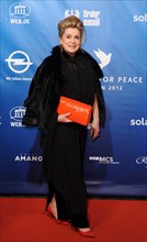 French actress Catherine Deneuve arrives for the charity event Cinema for Peace within the scope of