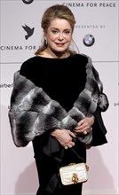 French actess Catherine Deneuve arrives at the 'Cinema
for Peace' gala at the 59th Berlin