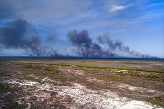 Black smoke from a distant bush fire, Broome, West Kimberley, Western Australia