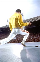 Freddie Mercury of Queen, performing live during the bands 'Magic Tour' at Wembley Stadium in 1986.