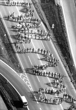 (dpa files) - An aerial view shows a line of peace demonstrators, protesting against the stationing