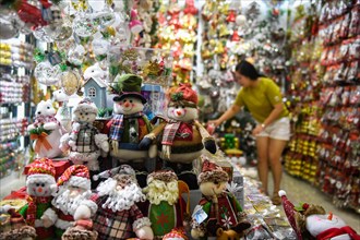 BEIJING, Dec. 14, 2019 () -- Christmas commodities are seen at a booth of the Yiwu International