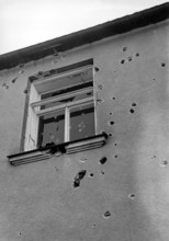 The Nazi news service picture shows - in the run-up to the Munich Agreement - bullet holes in a