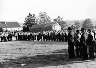 The Nazi propaganda picture shows men lining up for the Sudeten German Freikorps in September 1938.