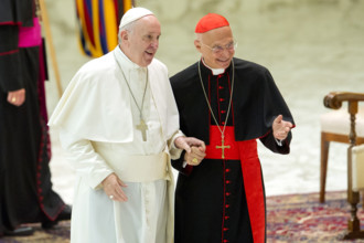 Pope Francis with Cardinal Angelo Bagnasco during the audience to the boy scouts participants at
