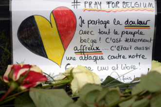 Flowers and messages of condolence laid outside the Belgian embassy in Berlin, Germany, 23 March