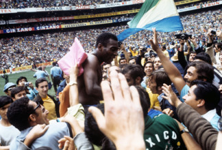 Brazil wins the 1970 Soccer World Cup in Mexico City, on 21 June 1970. Pele is celebrated by fans.