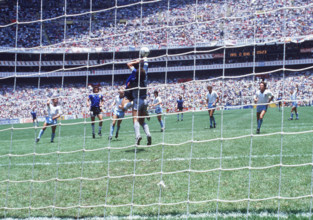 Diego Maradona, Argentina, scoring the legendary "Hand of God" goal during the England - Argentina