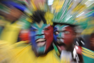 South African fans celebrate on the stand prior to the 2010 FIFA World Cup group A match between