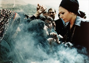 Farah Pahlavi visiting villagers