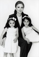 Farah Pahlavi and her two grand-daugthers Noor and Iman.