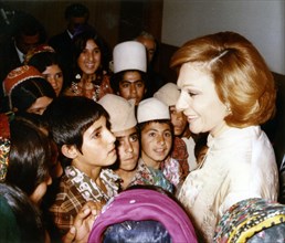 Farah Pahlavi visiting the country side