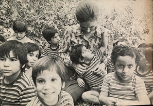 Farah Pahlavi - visit in an orphanage in Iran.