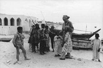 Farah Pahlavi visiting a village on Kish island. 1975