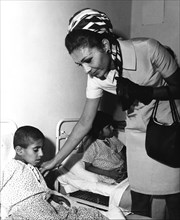 Farah Pahlavi visiting a hospital - Tehran, 1969