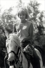 Sylvie Vartan on horse-back