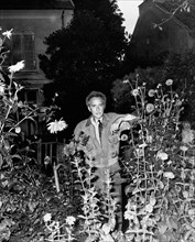 Cocteau in his garden of Milly-la-Forêt, South of Paris