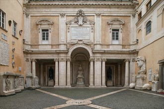 The Courtyard Of Palazzo Dei Conservatori. The Large Open-Air Space Contain Important Examples Of Roman Sculpture. On The Left We Can See Remains Of The Cell Decoration From The Temple Of The God Hadr...
