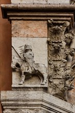 Ferrara, the Cathedral dedicated to St. George, façade detail with knight.