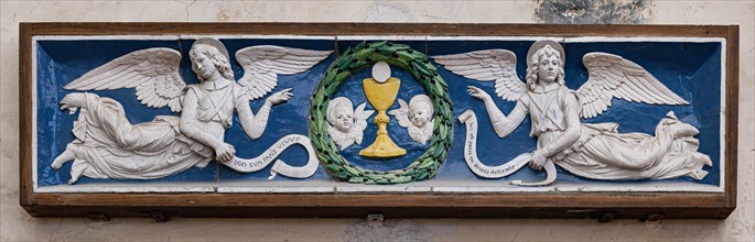 Andrea Della Robbia: 'Two Angels adoring the Eucharist Chalice'