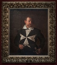 Portrait of a knight of Malta by Caravaggio