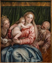 “Madonna and Infant Jesus between S. Catherine of Alessandria and Peter”, by Veronese
