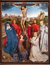 “Crucified Christ with the Virgin, St. John the Baptist and the Evangelist, Mary Magdalena and two cistercian abbots”, by Hans Memling