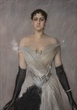 “Portrait of a lady in white with gloves and fan” by Giovanni Boldini