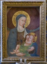 Montepulciano, church of Sant'Agnese: “Nursing Madonna", detached fresco by a Siena painter from