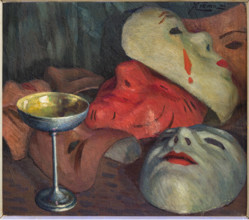 “Natura morta con maschere e calice, di Giovanni Battista Crema (FE 1883 - 1964).
Olio su