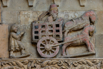 Fidenza, Duomo (Cattedrale di S. Donnino), Facciata: bassorilievo con "Il profeta Elia rapito in