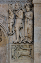 Fidenza, cathedral (Cathedral of San Donnino), facade, panel: a centaur strikes a deer and above