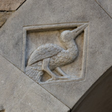 Fidenza, Duomo (Cattedrale di San Donnino), facciata, portale sinistro, protiro, serie di losanghe